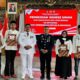 Perwakilan Narapidana Secara Simbolis Menerima Berkas Administrasi Remisi Di Pendopo Agung Bangkalan