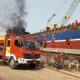 Mobil Damkar Saat Berupaya Memadamkan Kobaran Api Di Galangan Kapal Milik Pt Ben Santosa.
