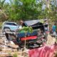 Mobil Pikap Yang Terperosok Ke Kuburan Di Jalan Raya Sogian Omben. (Foto : Okenews)