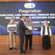 Kepala Dinas Peternakan Bangkalan Ahmad Hafid Saat Menerima Penghargaan Jumlah Eartag Terbanyak.