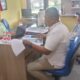 Ketua Bawaslu Kabupaten Bangkalan Ahmad Mustain Saleh Saat Melaporkan Ke Mapolres Bangkalan.
