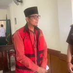 Terdakwa Saat Mengikuti Sidang Di Pn Bangkalan.