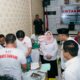 Warga Antusias Ikuti Khitanan Massal Polres Sampang, Bagian dari HUT Bhayangkara